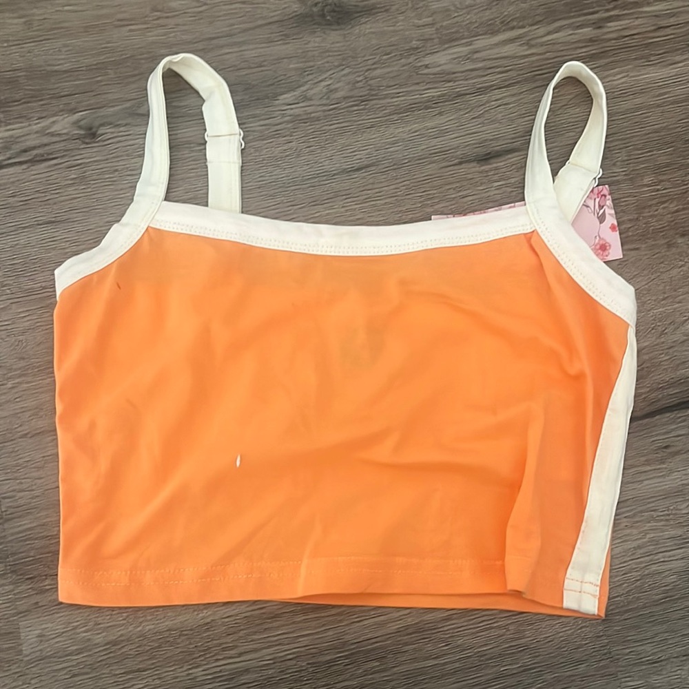 Orange tank w/ white lining